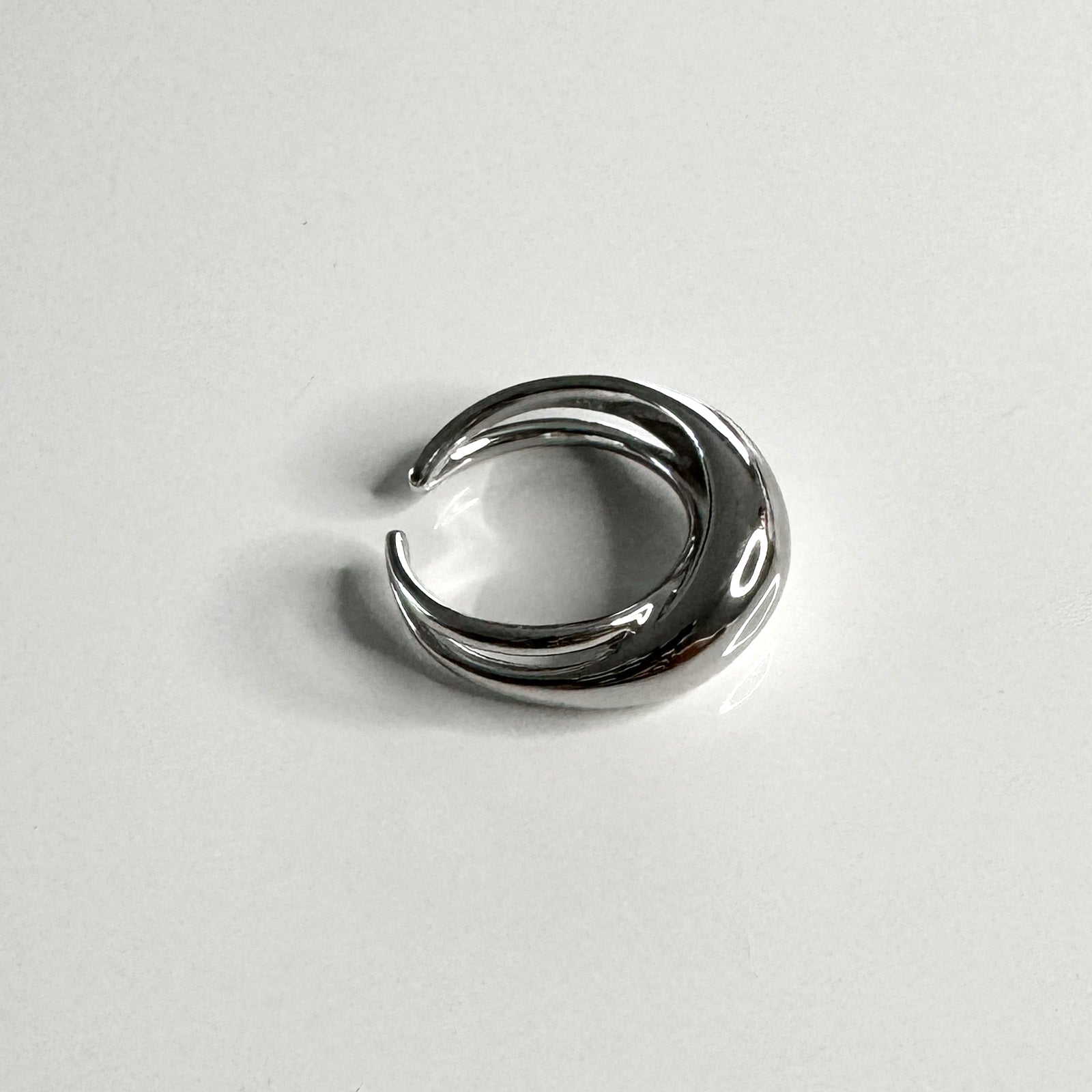side view of rhodium plated dome cut out ring