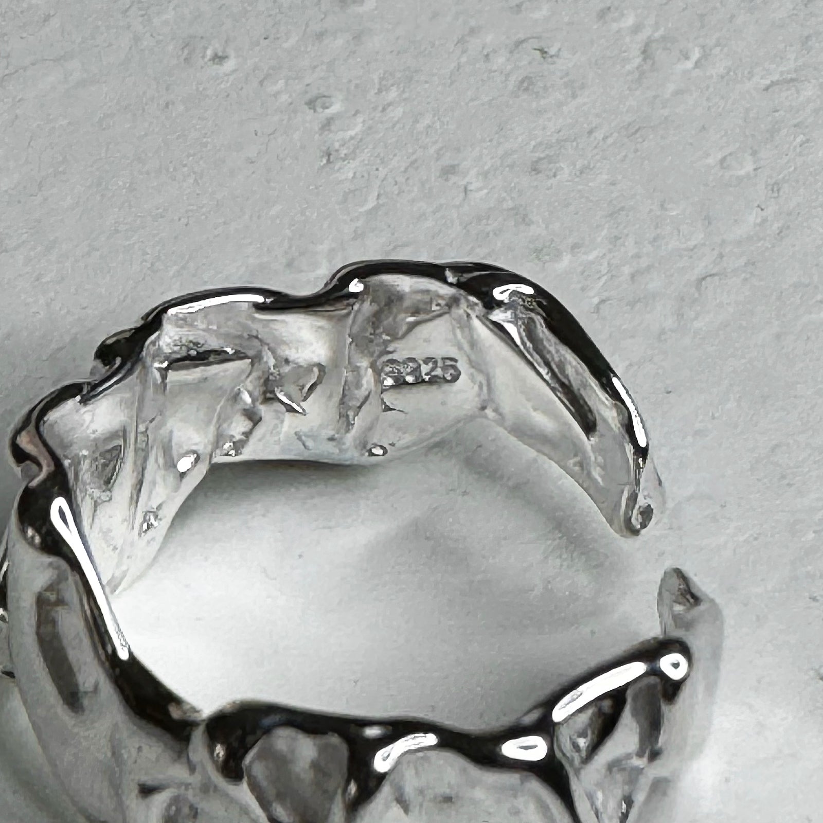 Close up detail view of Abstract Wrinkle Ring. Made with genuine 925 sterling silver. handcrafted rings
