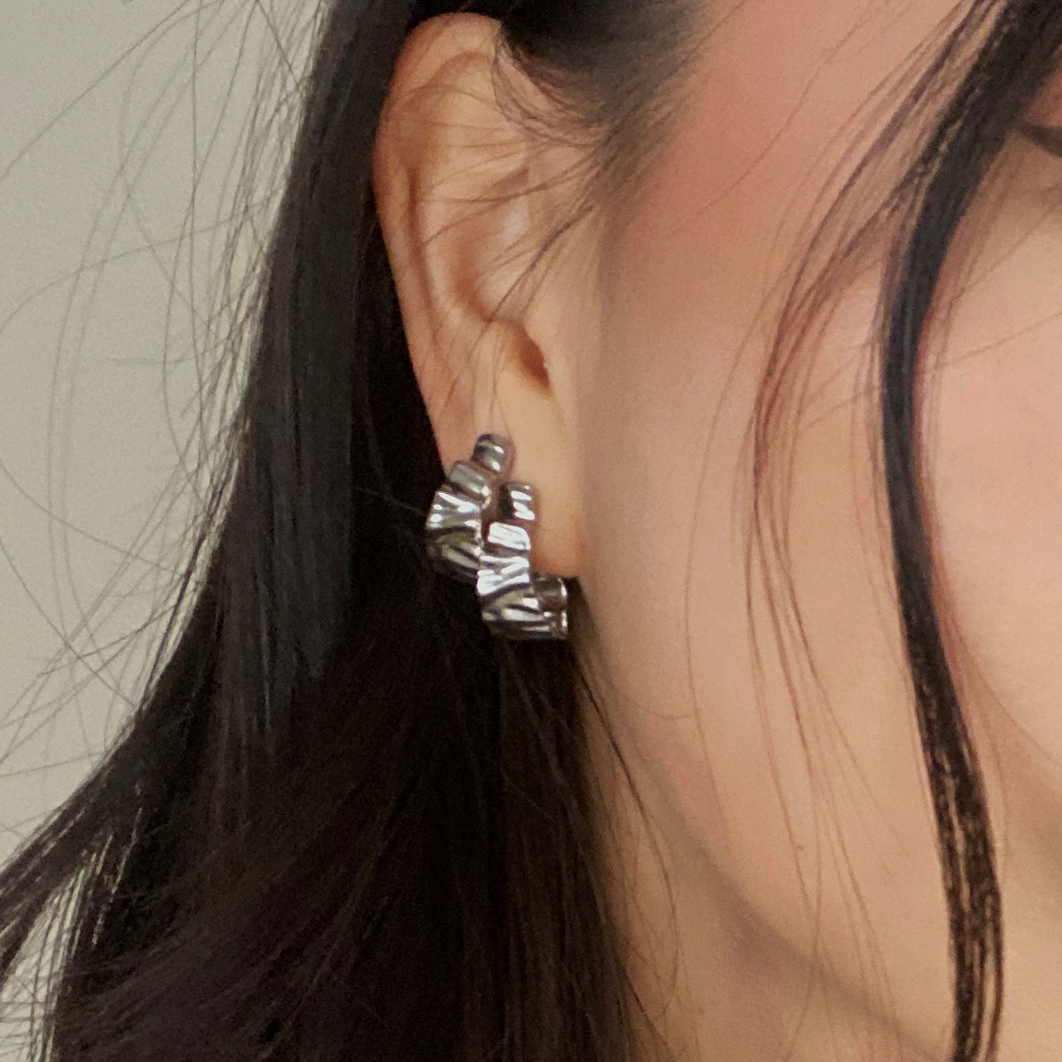 Shop these silver crinkle hoop earrings featuring a crinkle design with a push back for closure. 925 sterling silver hoop earrings.